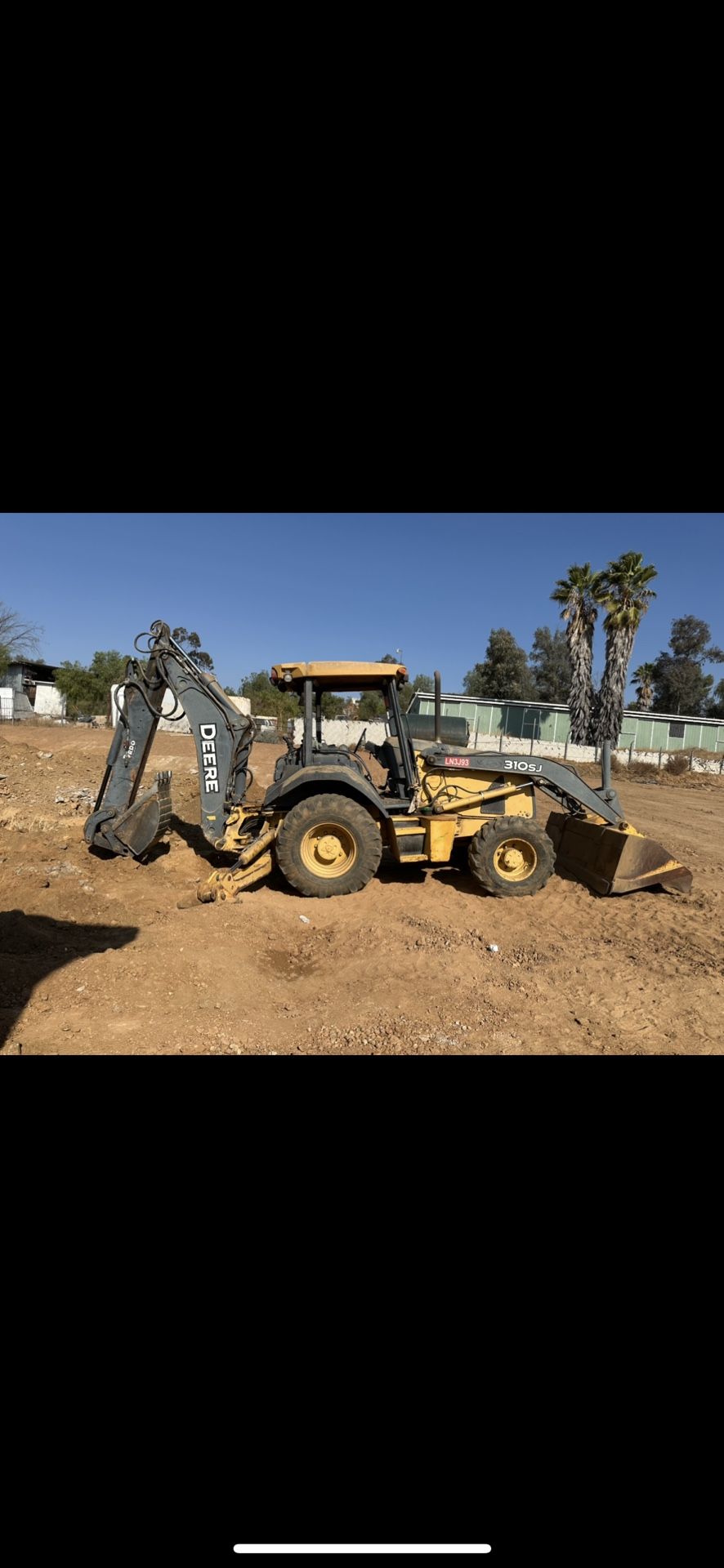 310sj Backhoe
