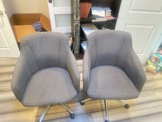 Pair of grey office chairs