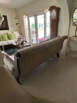 Antique Large, deep sitting couch. Dark wood