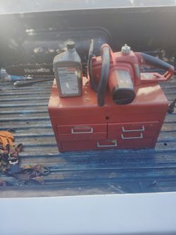 Chane Saw And Toolbox