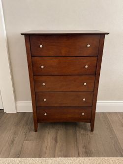 Delivery Available! Modern Wooden 5 Drawer Tall Storage Dresser Chest! Good condition! Drawers slide great! Some wear on top and damage on top edge se