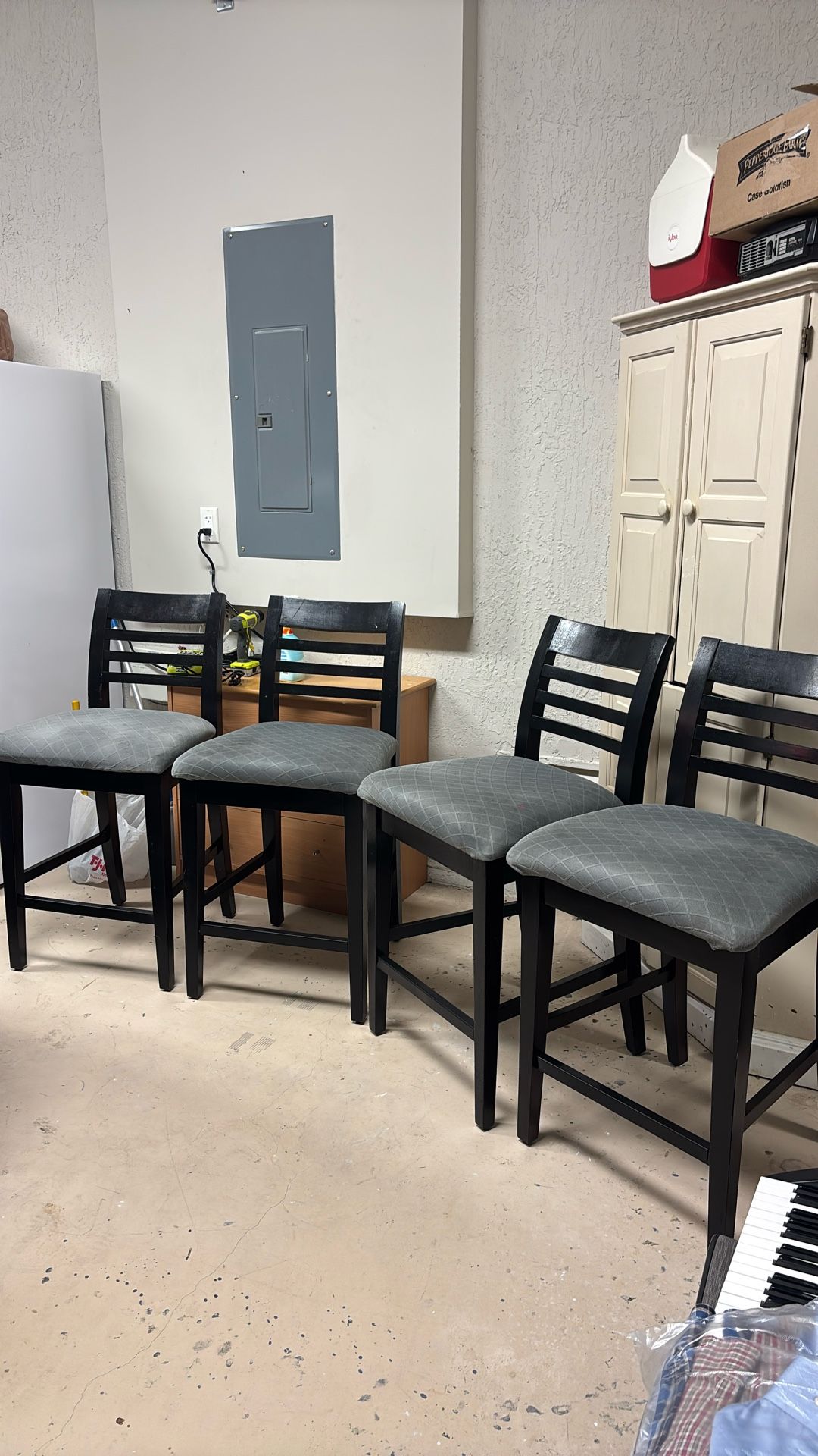 Four Counter Height Stools With Backs