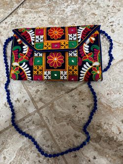 Embroidered Clutch Bag with Beaded Strap