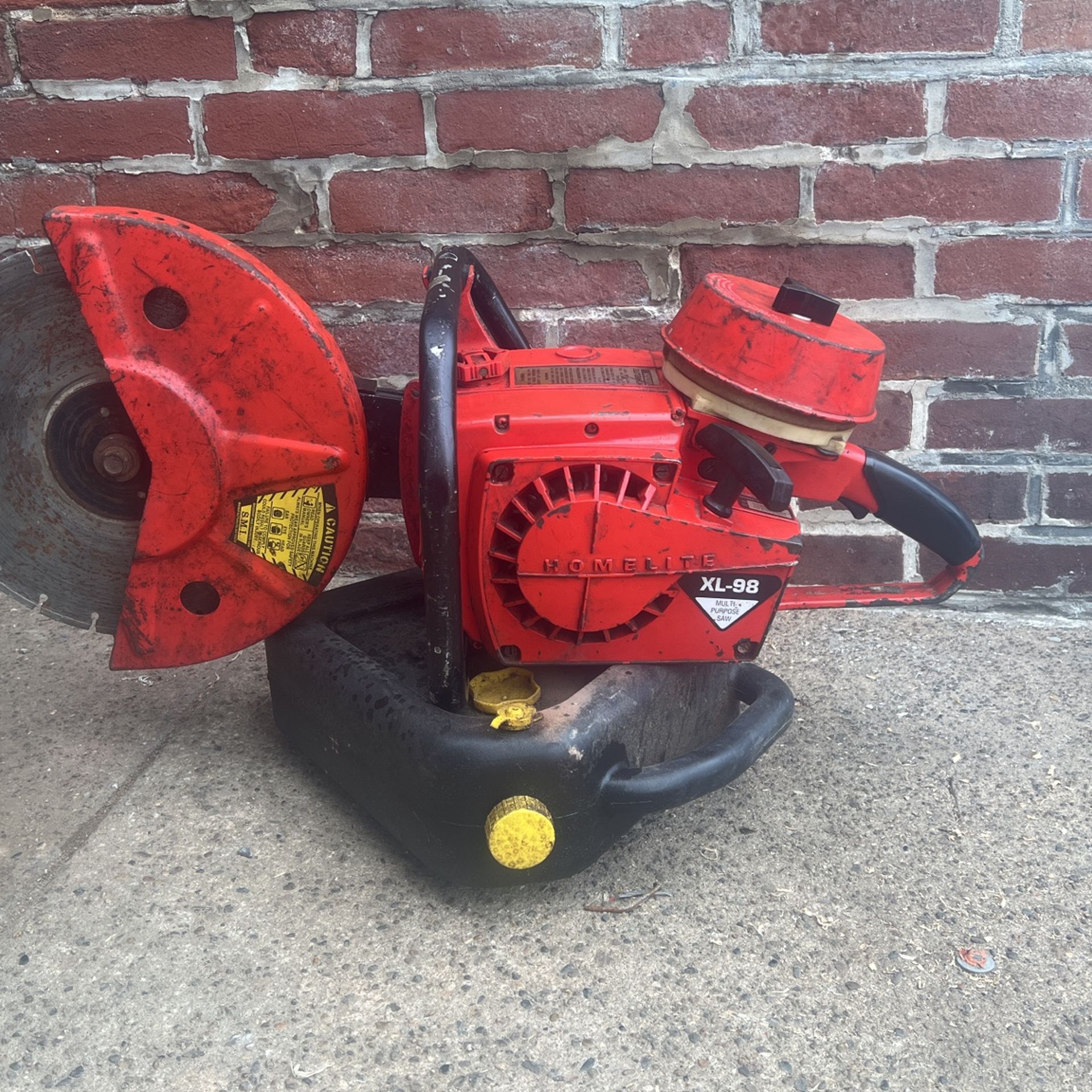 HOMELITE XL98 multipurpose concret demo saw works great !
