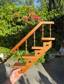 Vintage wooden staircase display shelf with pegs