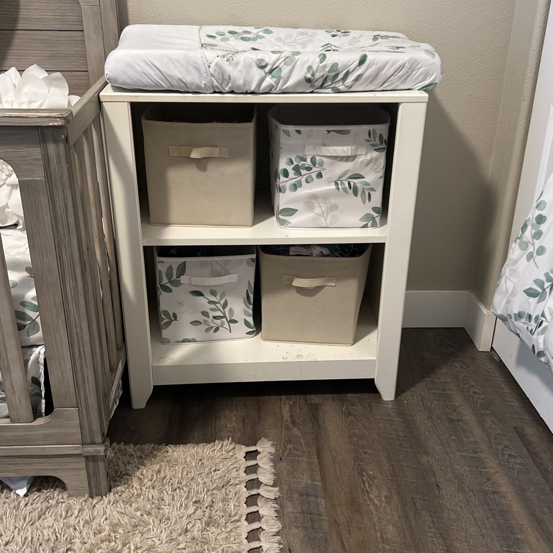 Baby changing table with pad