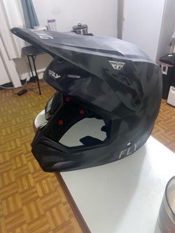Fly Racing dirt bike helmet and goggles