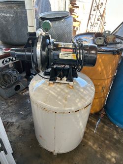 Shallow well pump and tank