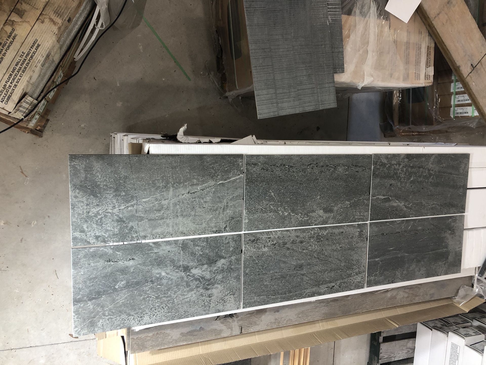 porcelain Tile.  4,000 sq ft at $2.00 square ft 