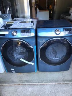 blue stackable washer and dryer