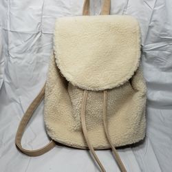 No Boundaries Shearling Mini Drawstring Backpack Purses. New measures 12" L X 10" W X 6" D . Smoke free home.  Cream color

