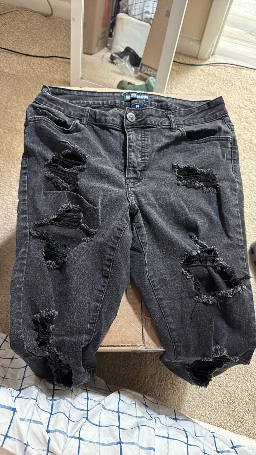 black ripped jeans