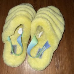 UGG Fluff Yeah Slide slippers in a neon yellow color. 