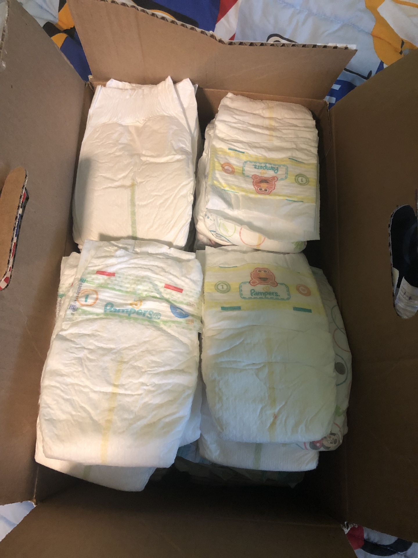 Huggies and pampers diapers, size 1 and N