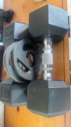 25 lb dumbbells & 2 2.5
