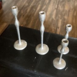 Four Candleholders