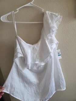 Blusa Michael  kors Size 16  pero queda mejor como L es nueva