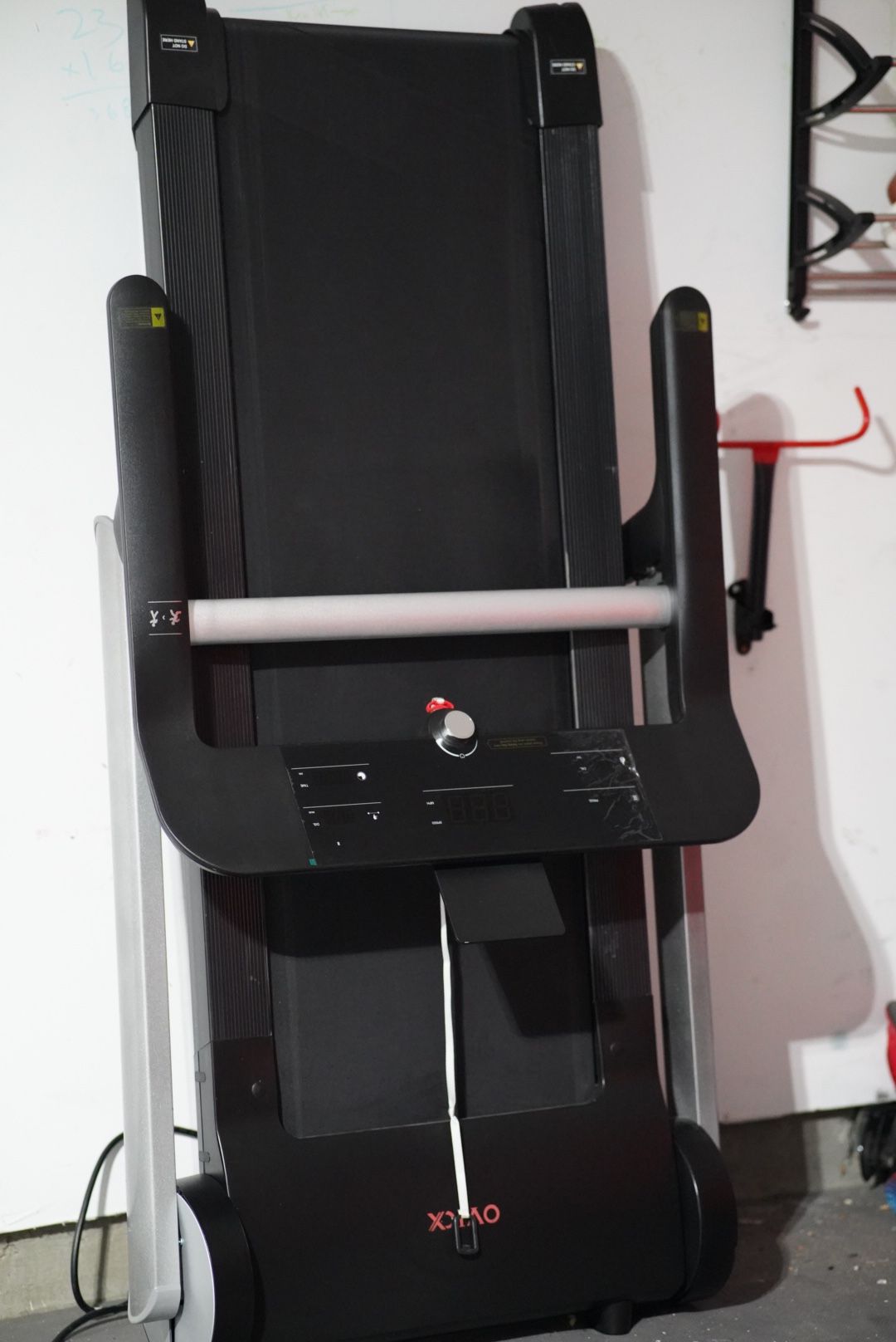 Barely Used Modern Treadmill: Slim Design,  180 Degree Fold, Built In Bluetooth,  12 MPH, Heartrate Strap