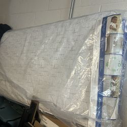 Sealy Cozy Rest 2-Stage Extra Firm Crib and Toddler Mattress: Hypoallergenic, Waterproof Cover, Innerspring, 5.25" Thickness