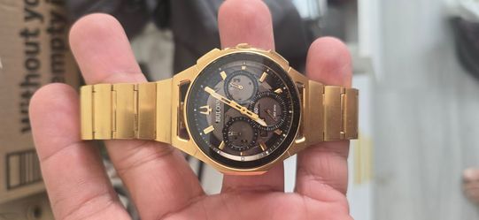 Bulova
Bulova Men's Watch - Curv Quartz Chronograph Black Dial Yellow Gold Steel | 97A144