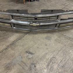 OEM Chevy Chrome Grille – Silverado / Tahoe / Suburban (1995–1999)