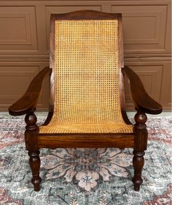 Antique Wooden and cane British Colonial lounge chair