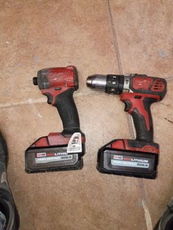 Milwaukee impact  and Milwaukee drill with 2 red lithium 6.0ah batteries asking 130 obo