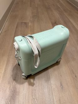 Stokke JetKids BedBox Ride-On Suitcase & In-Flight Bed - Green