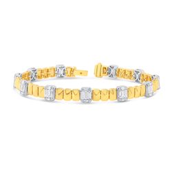 Uneek Bracelet 18K White & Yellow Gold BR2398 This alexandria collection designer bracelet is fine for any get up. Crafted with 44 round diamonds weig