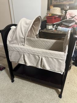 Eddie Bauer Bassinet Real Wood for Sale in Bethany OK OfferUp