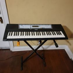 Yamaha PSR-E213 Portable Electric 61 Key Keyboard
With Stand 