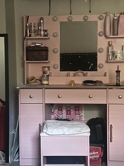 Pink vanity mirror set with chair included