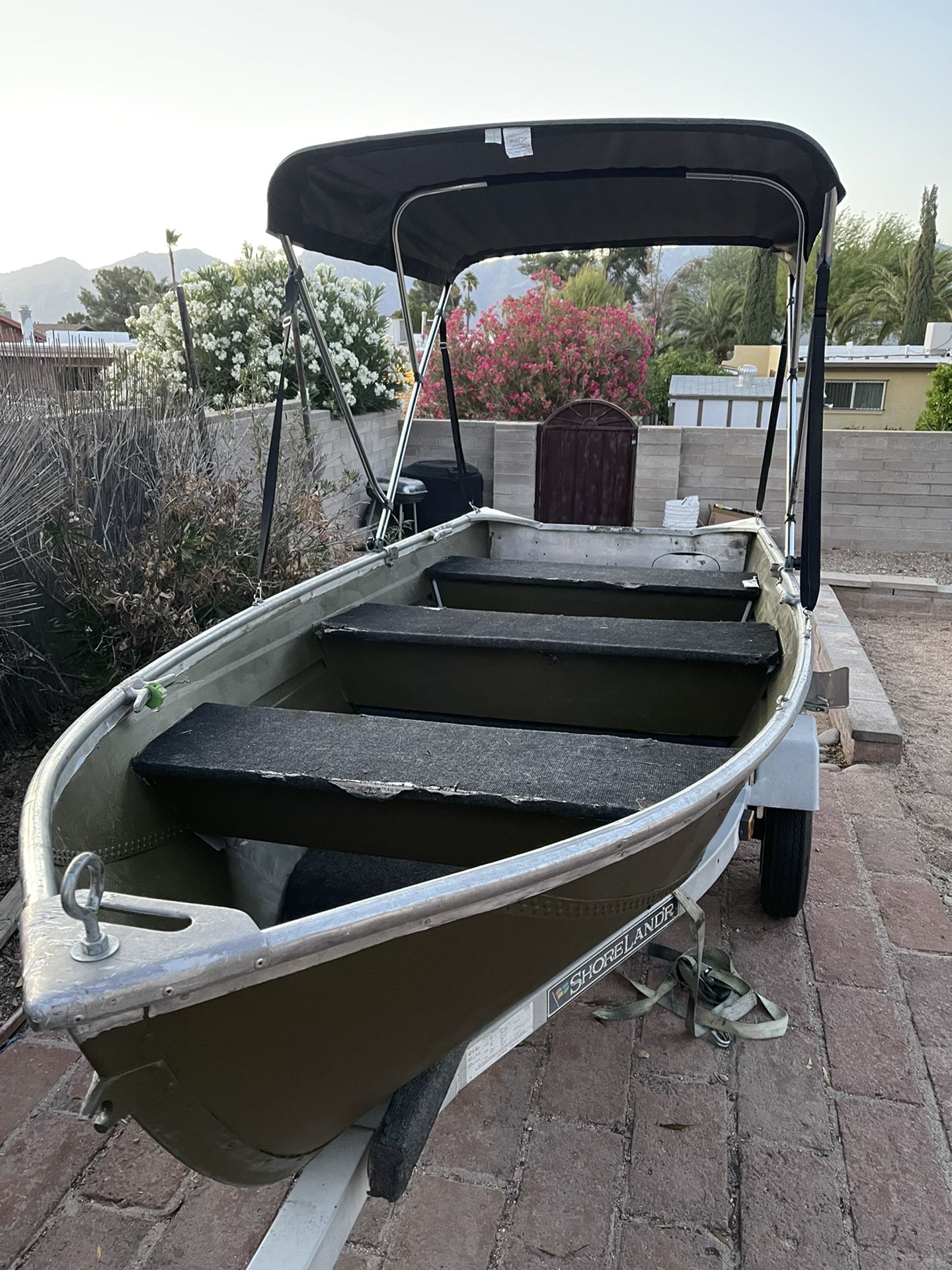 Photo 12 ft aluminum fishing boat with extras.