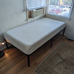 Twin bed frame + Mattress for sale (barely used)