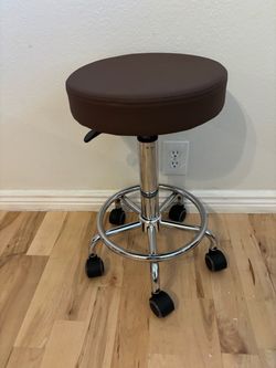 Brown Backless Stool 13” across, height 21” to 29”