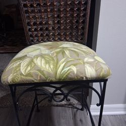 Two wrought iron high chairs