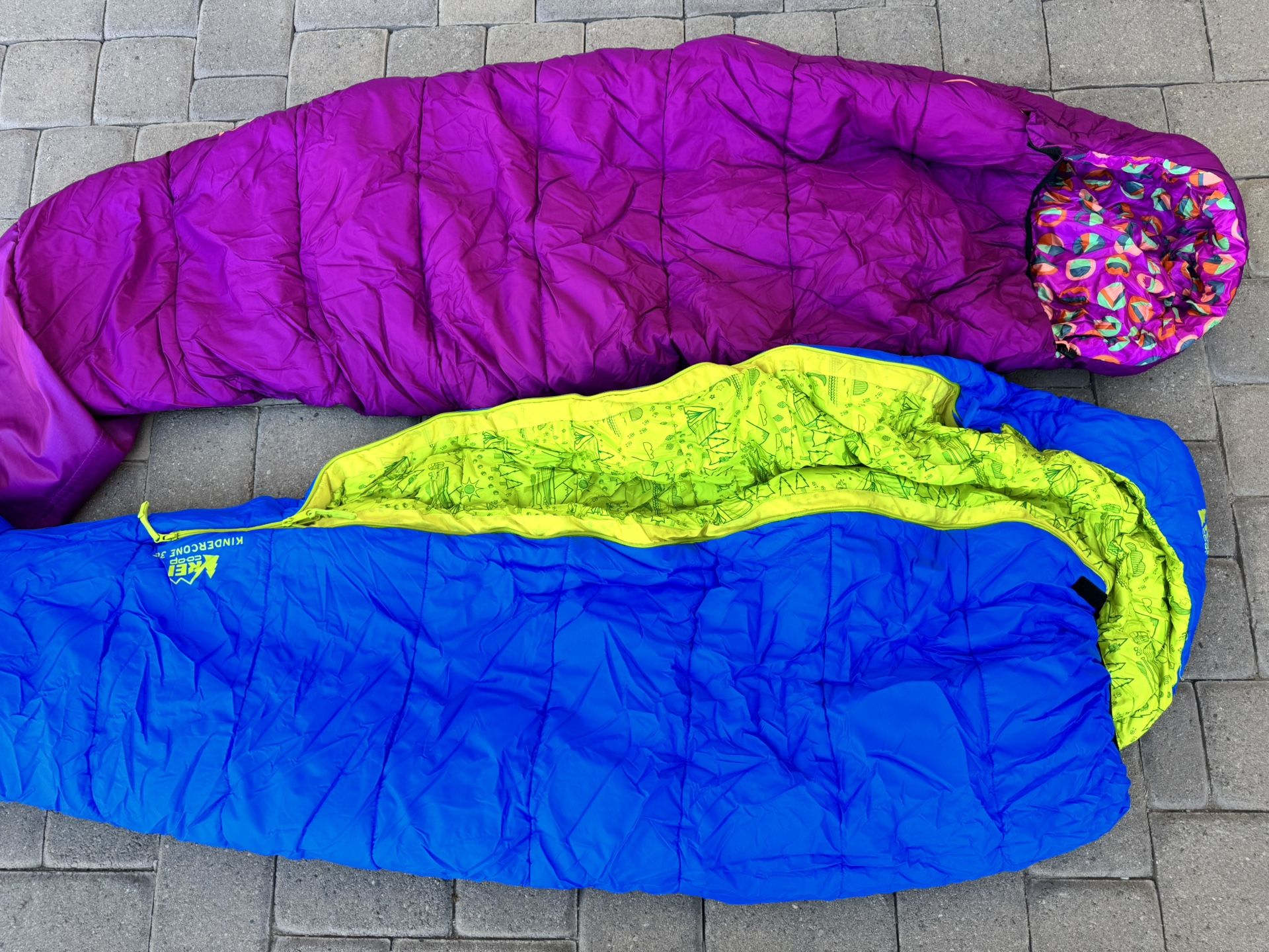 2 REI Kids Sleeping Bags With Pads
