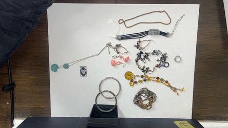 Assorted costume, jewelry mixed items bracelets earrings gently used