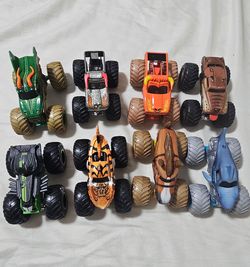 $35 Monsters trucks bundle of 8