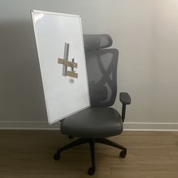 Ergonomic office chair and white board