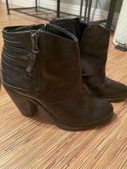 Jessica Simpson black leather boots