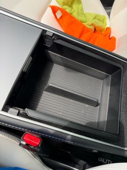 Tesla cabinet compartment spigen