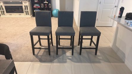 3 grey chairs