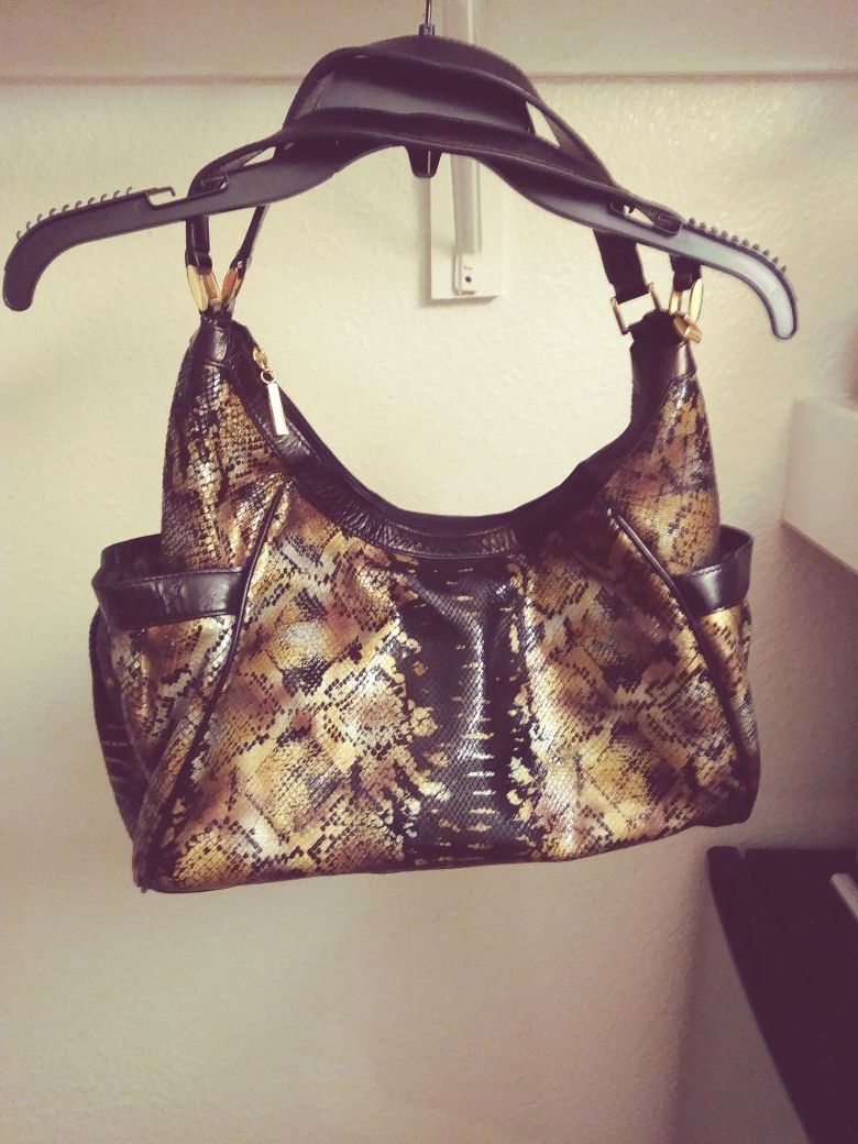 A snake skin leather [[Tohe Fznd designer]] Tote handbag/purse.