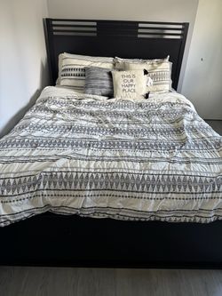Full size bed with mattress and box spring
