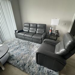NEW Rooms To Go - Leather Couch, Recliner and Rug