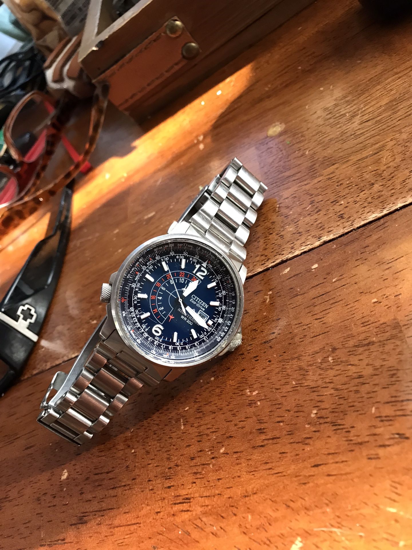 Eco Drive.  No Need For Battery. Holds Charge By Light. 