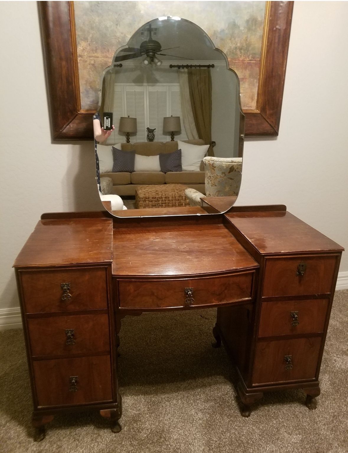 Antique vanity with large beveled mirror