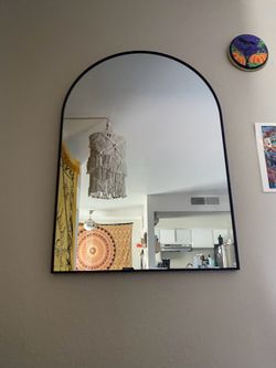 Arched hanging wall mirror black frame