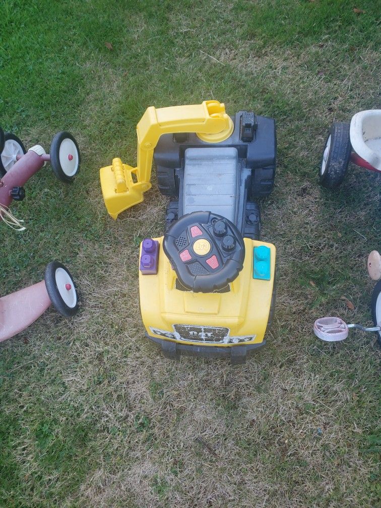 Trike And Ride On Digger.